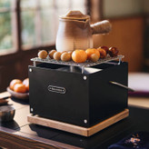 گریل رومیزی زغالی نیچرهایک مدل CNK2300CF010 در حال پخت گوشت در طبیعت